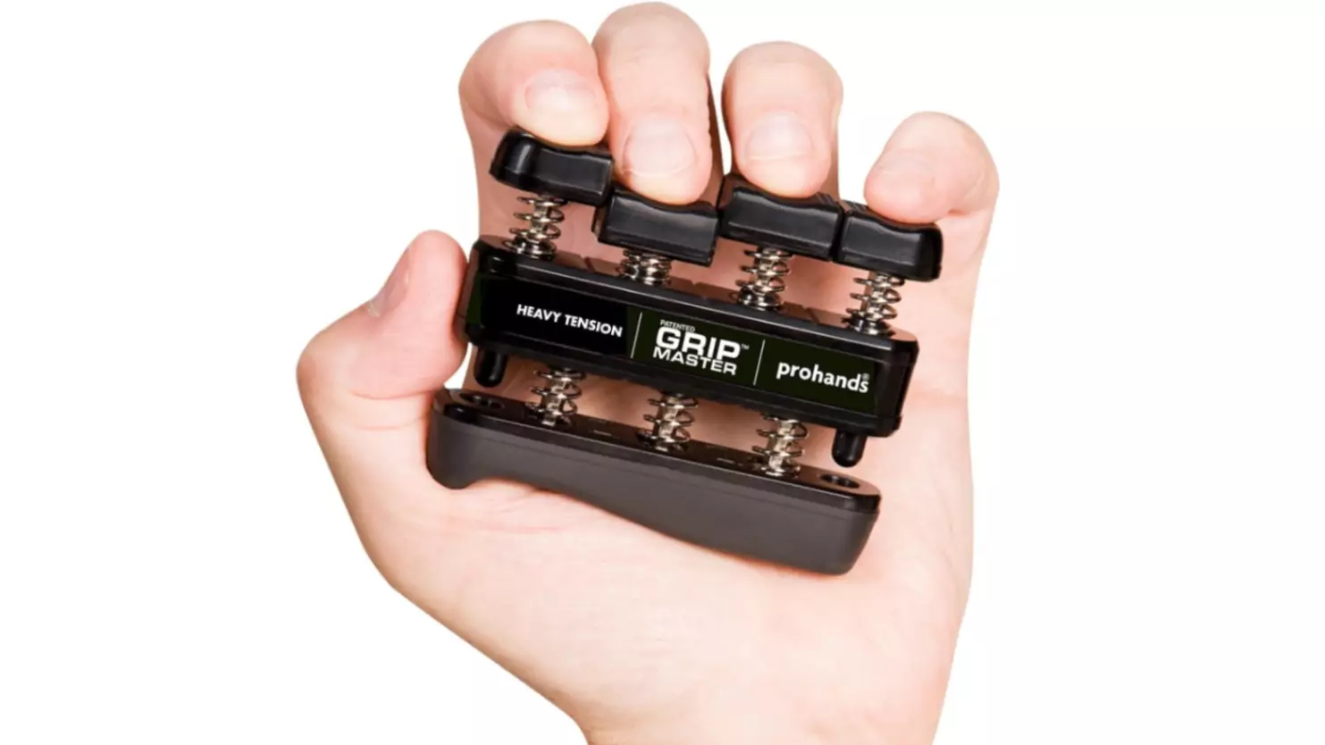 Close-up of a hand gripping a black GripMaster Wrist Twister and hand strengthener. The device features individual spring-loaded pistons for each finger, labeled Heavy Tension, designed for grip strength training and finger rehabilitation.