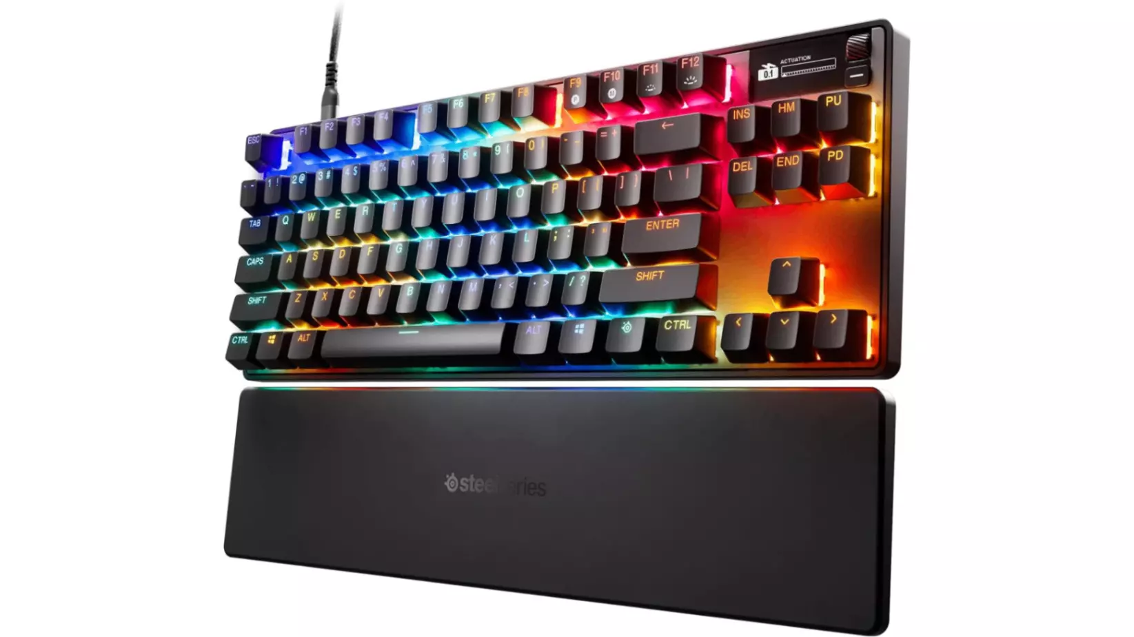 The SteelSeries Apex Pro TKL hall effect keyboard, our "Best Overall" pick, shown with its detachable magnetic wrist rest and vibrant rainbow RGB lighting.